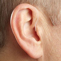 Aide auditive mini-écouteur déporté dans oreille RIC